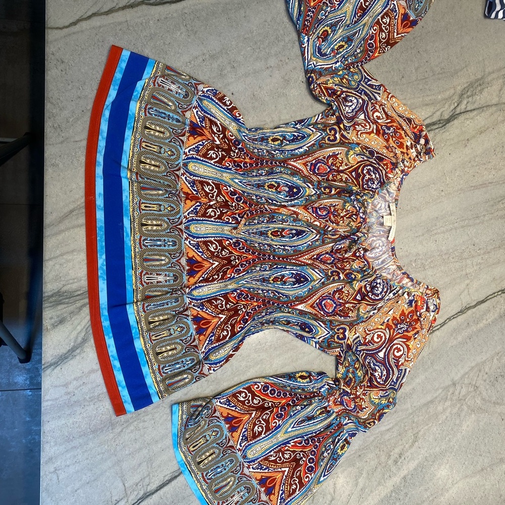This is a Boston Proper shirt with an elasticize empire type waist